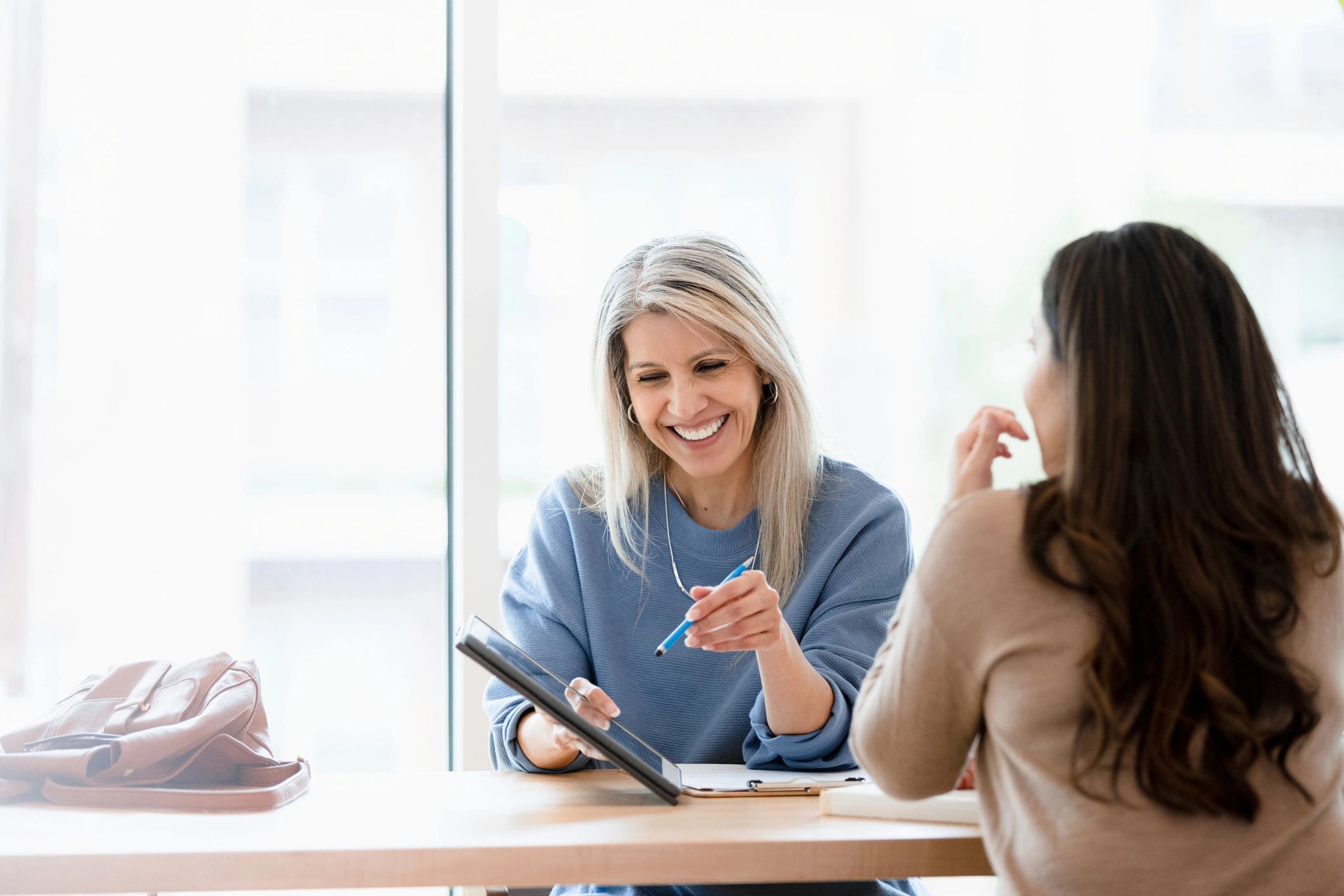 Professional headshot-style image of a business advisor