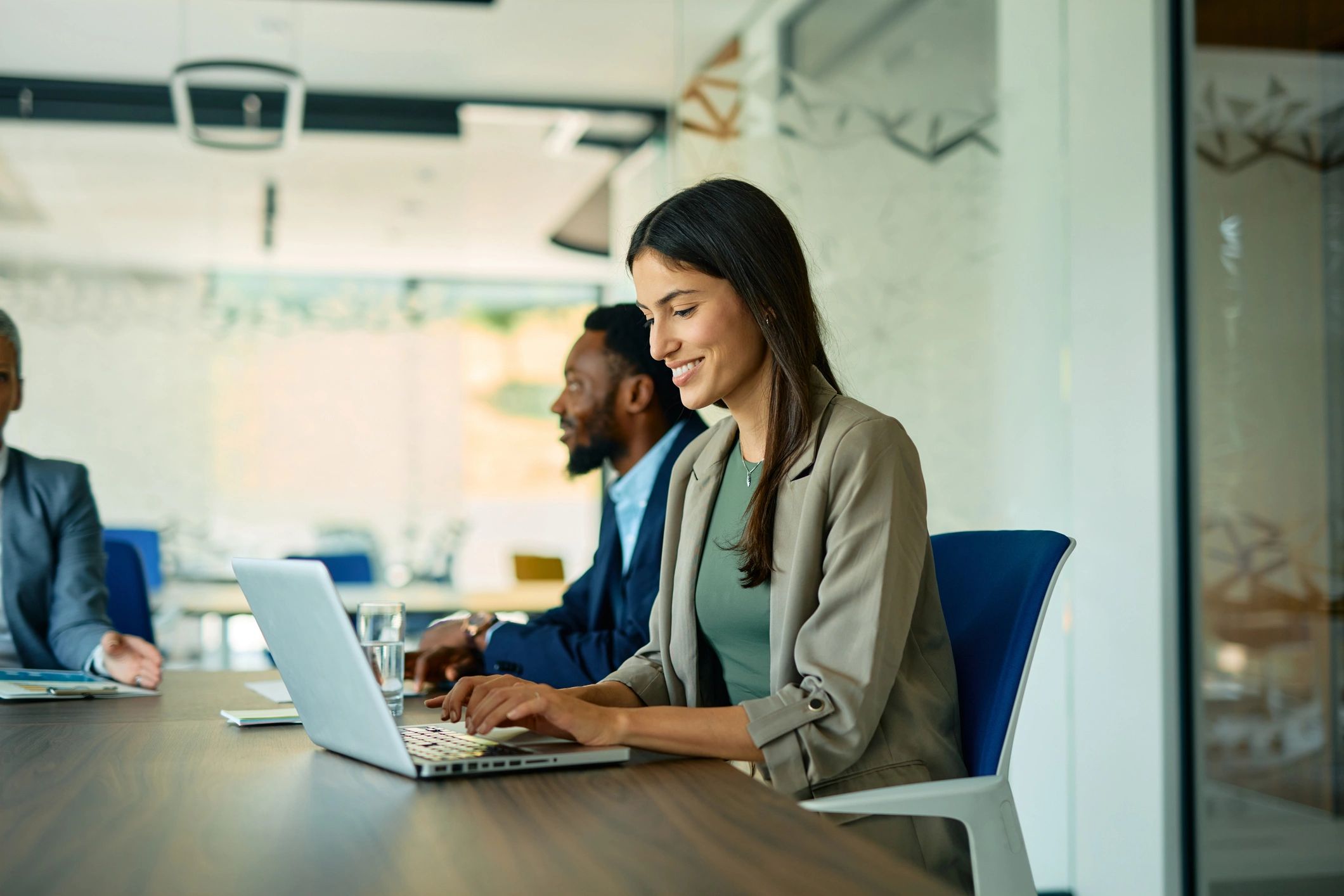 Office team collaborating to represent productive Microsoft 365 adoption